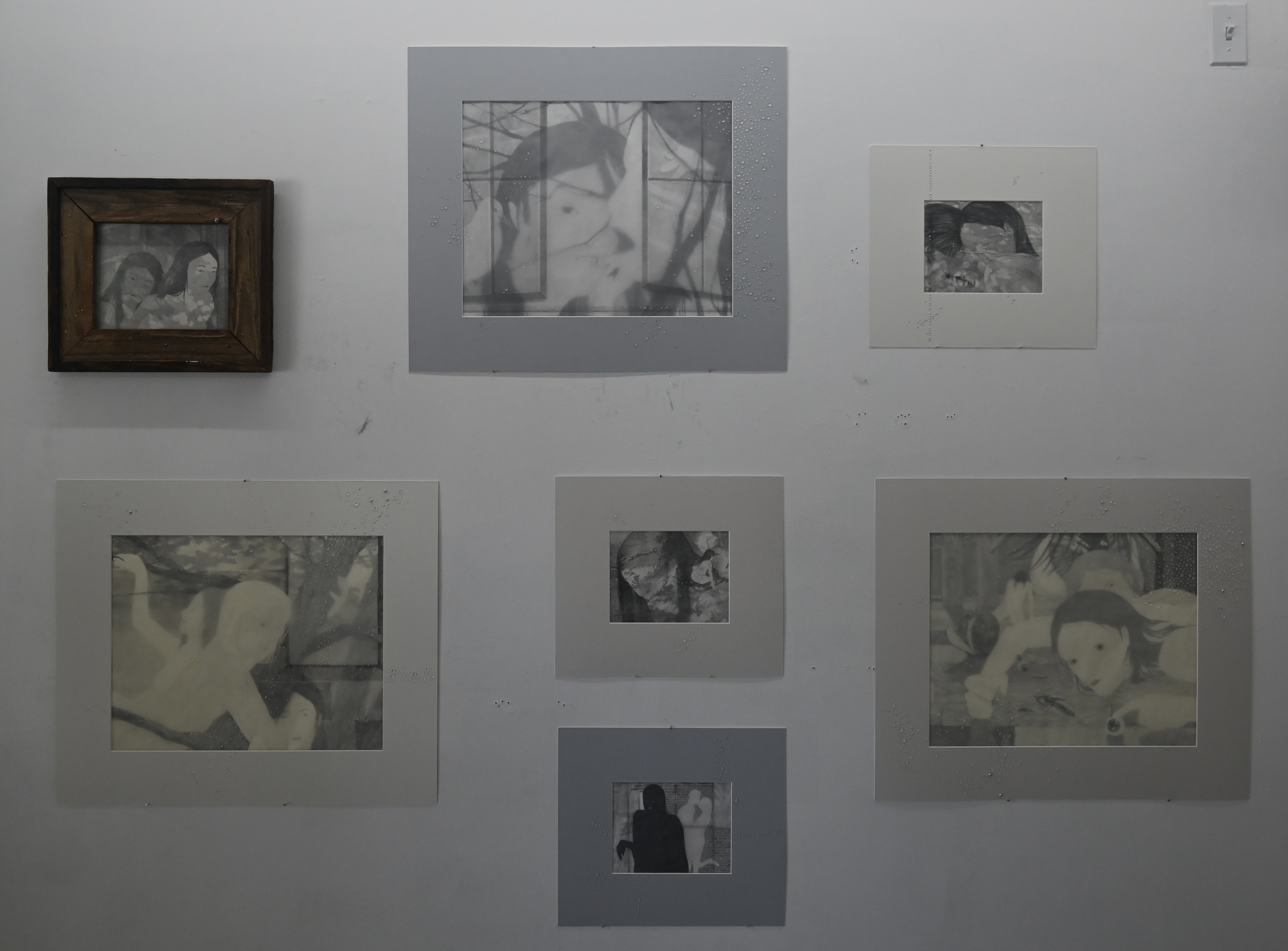 Wall installation of works by Naomi Hawksley